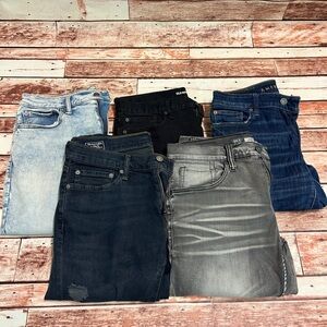 Five pairs of men’s jeans
